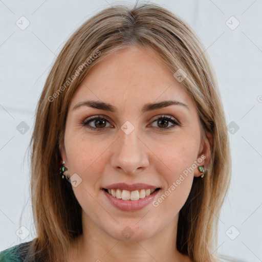 Joyful white young-adult female with medium  brown hair and green eyes