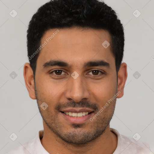 Joyful latino young-adult male with short  black hair and brown eyes