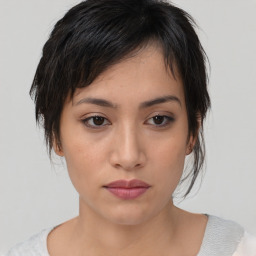 Neutral asian young-adult female with medium  brown hair and brown eyes