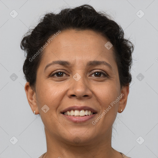 Joyful white adult female with short  brown hair and brown eyes