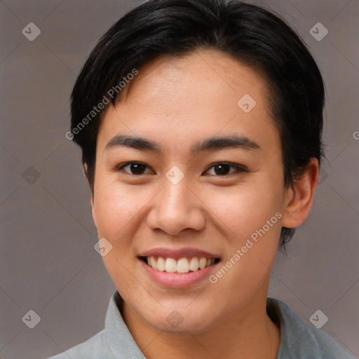 Joyful asian young-adult female with short  brown hair and brown eyes