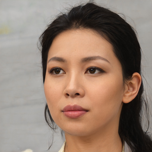 Neutral asian young-adult female with medium  black hair and brown eyes