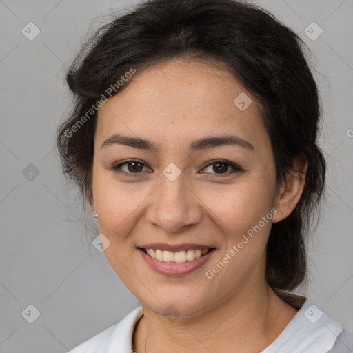 Joyful latino young-adult female with medium  brown hair and brown eyes