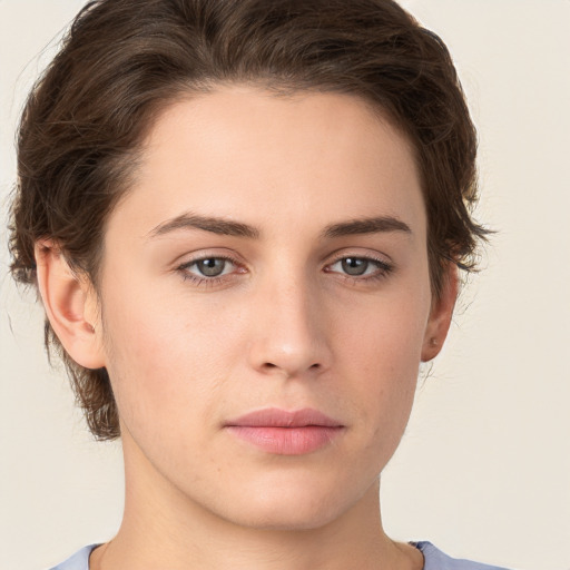 Neutral white young-adult female with short  brown hair and brown eyes