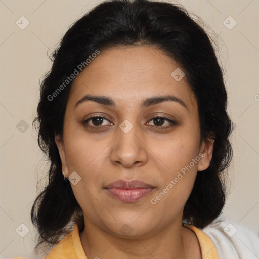 Joyful latino young-adult female with medium  brown hair and brown eyes