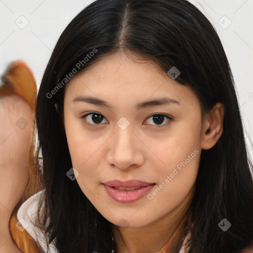 Joyful asian young-adult female with long  brown hair and brown eyes