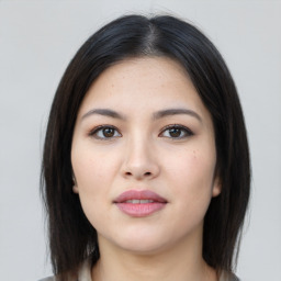 Joyful asian young-adult female with medium  black hair and brown eyes