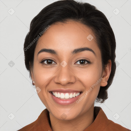 Joyful latino young-adult female with medium  black hair and brown eyes