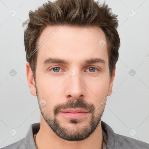 Neutral white young-adult male with short  brown hair and grey eyes