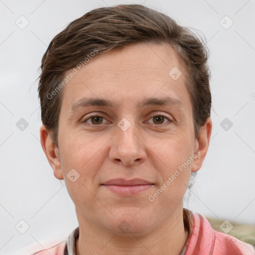 Joyful white adult male with short  brown hair and grey eyes