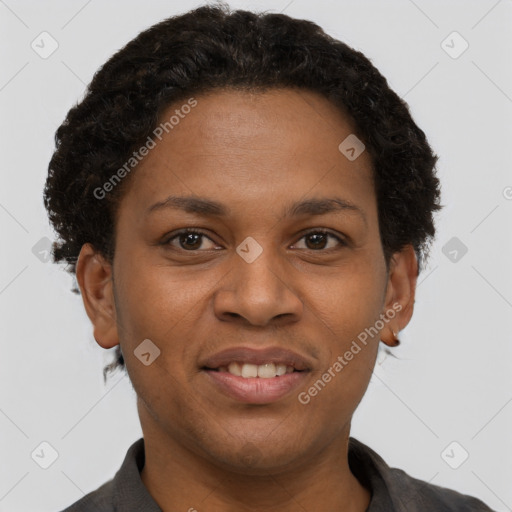 Joyful black adult female with short  brown hair and brown eyes