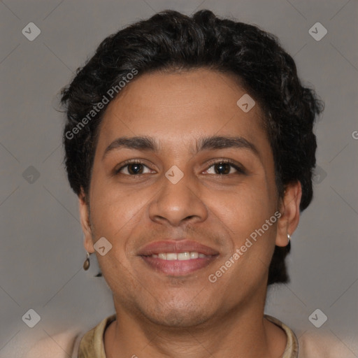 Joyful latino young-adult male with short  brown hair and brown eyes