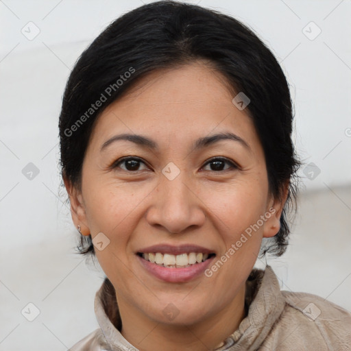 Joyful white adult female with medium  brown hair and brown eyes