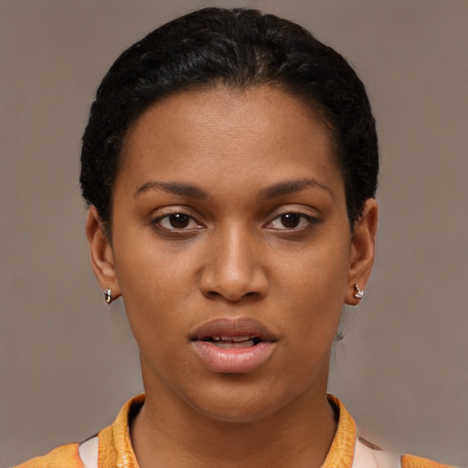 Joyful latino young-adult female with short  brown hair and brown eyes