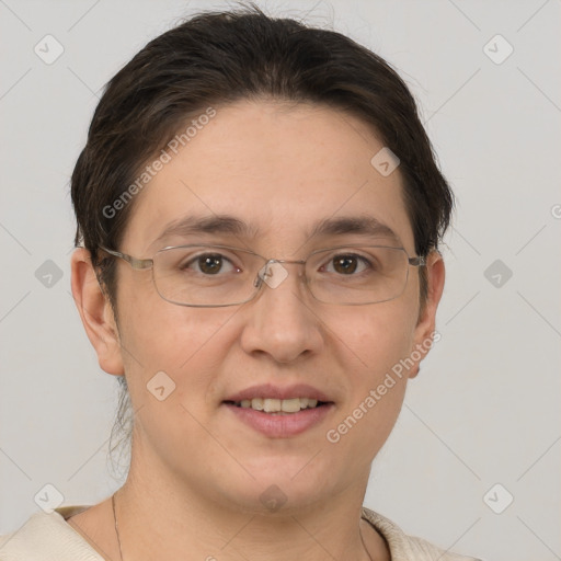 Joyful white adult female with short  brown hair and brown eyes