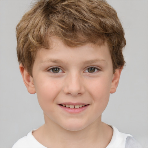 Joyful white child male with short  brown hair and brown eyes