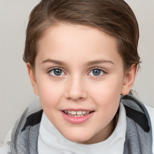 Joyful white child female with short  brown hair and brown eyes