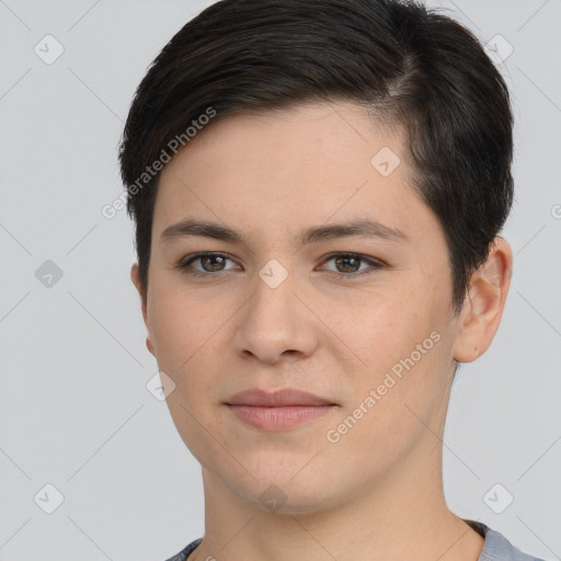 Joyful white young-adult female with short  brown hair and brown eyes