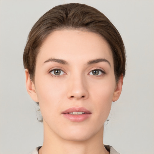 Neutral white young-adult female with short  brown hair and brown eyes