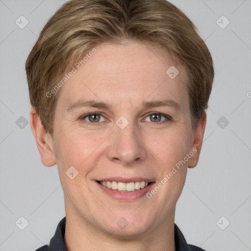 Joyful white adult female with short  brown hair and grey eyes