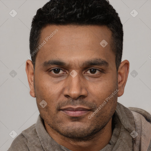 Neutral latino young-adult male with short  black hair and brown eyes
