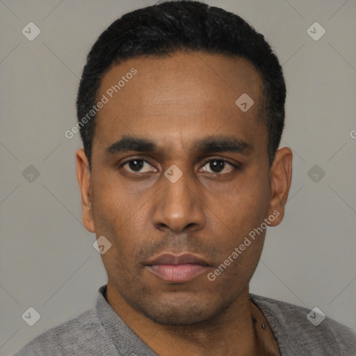 Neutral latino young-adult male with short  black hair and brown eyes