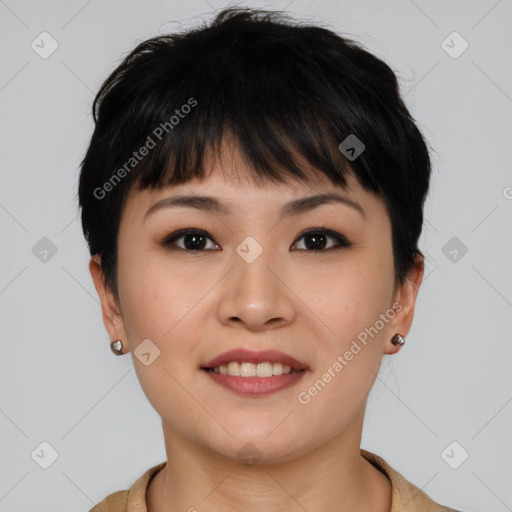 Joyful asian young-adult female with short  brown hair and brown eyes