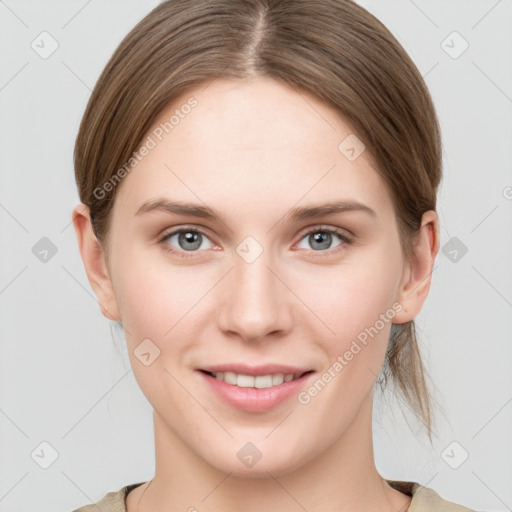 Joyful white young-adult female with medium  brown hair and grey eyes