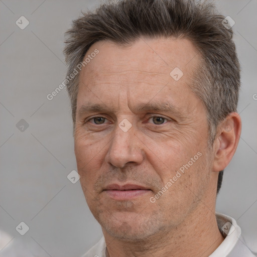 Neutral white adult male with short  brown hair and brown eyes