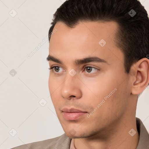 Neutral white young-adult male with short  black hair and brown eyes