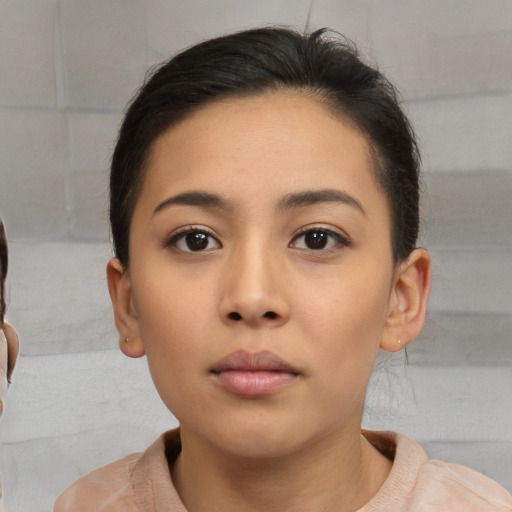 Neutral asian young-adult female with short  brown hair and brown eyes