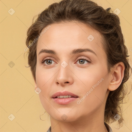 Joyful white young-adult female with long  brown hair and green eyes