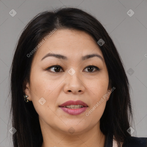 Joyful asian young-adult female with long  brown hair and brown eyes