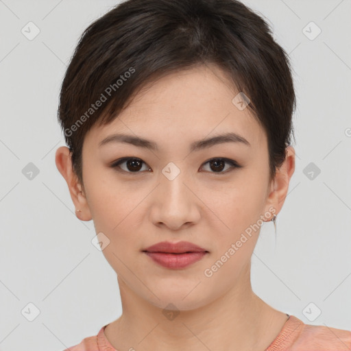 Joyful asian young-adult female with short  brown hair and brown eyes