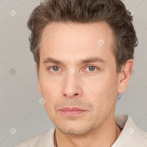 Neutral white adult male with short  brown hair and brown eyes