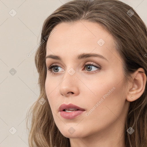 Neutral white young-adult female with long  brown hair and grey eyes