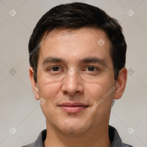 Joyful white adult male with short  brown hair and brown eyes