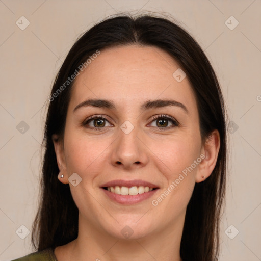 Joyful white young-adult female with long  brown hair and brown eyes