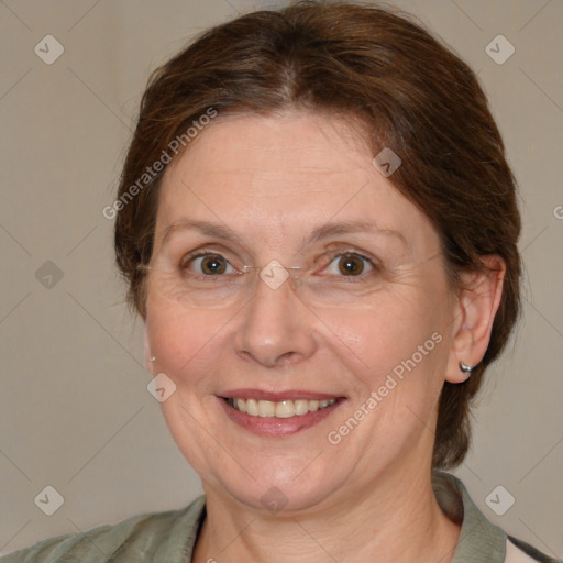 Joyful white adult female with medium  brown hair and grey eyes