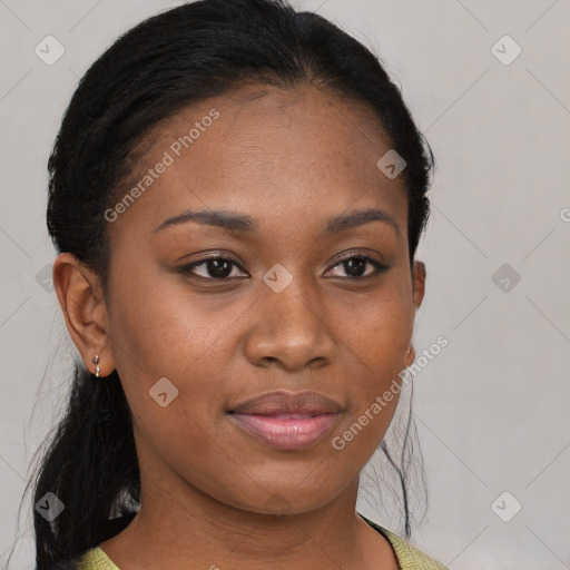 Joyful black young-adult female with medium  brown hair and brown eyes