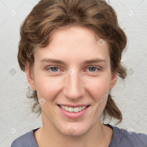 Joyful white young-adult female with medium  brown hair and blue eyes