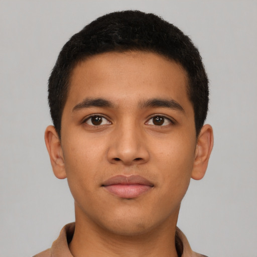 Neutral latino young-adult male with short  brown hair and brown eyes