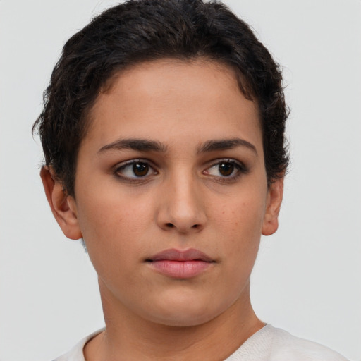 Neutral white young-adult female with short  brown hair and brown eyes