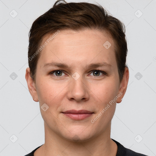 Joyful white young-adult female with short  brown hair and grey eyes