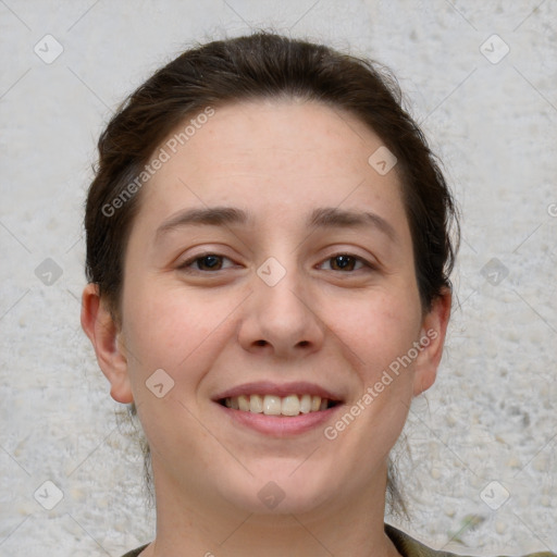 Joyful white young-adult female with short  brown hair and brown eyes