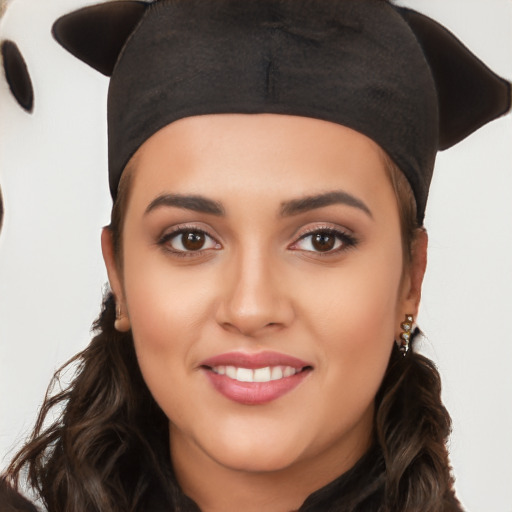 Joyful white young-adult female with long  black hair and brown eyes