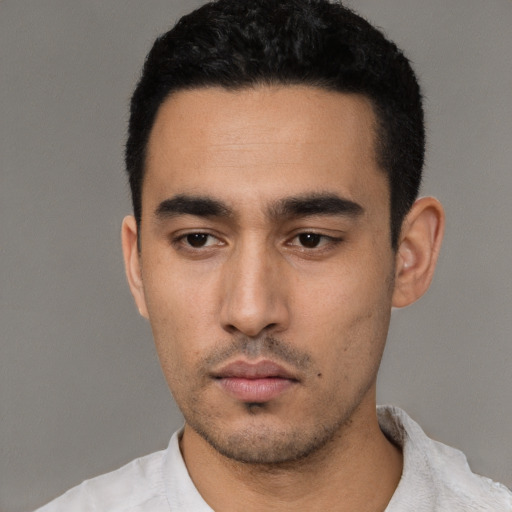 Neutral white young-adult male with short  black hair and brown eyes