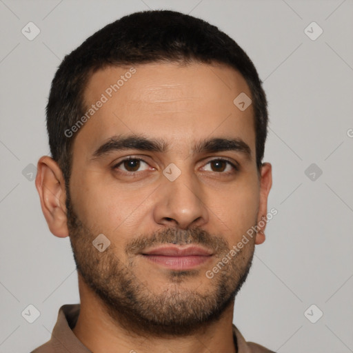 Joyful latino young-adult male with short  brown hair and brown eyes