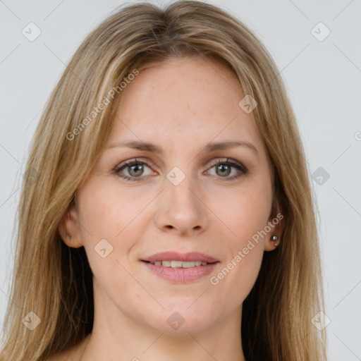 Joyful white young-adult female with long  brown hair and green eyes