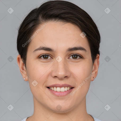 Joyful white young-adult female with short  brown hair and brown eyes